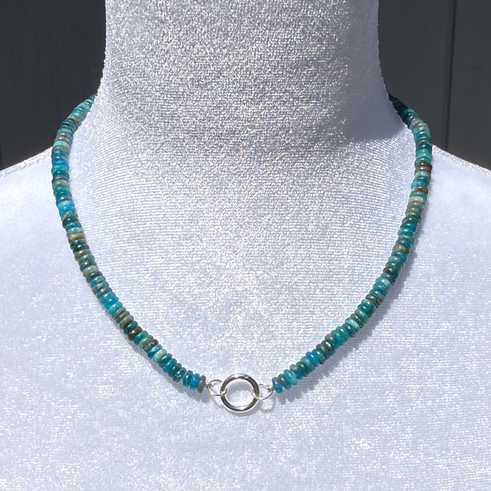 Rear View of Hand-Strung Blue Apatite Rondelle Necklace with Sterling Silver Connector Clasp on Mannequin