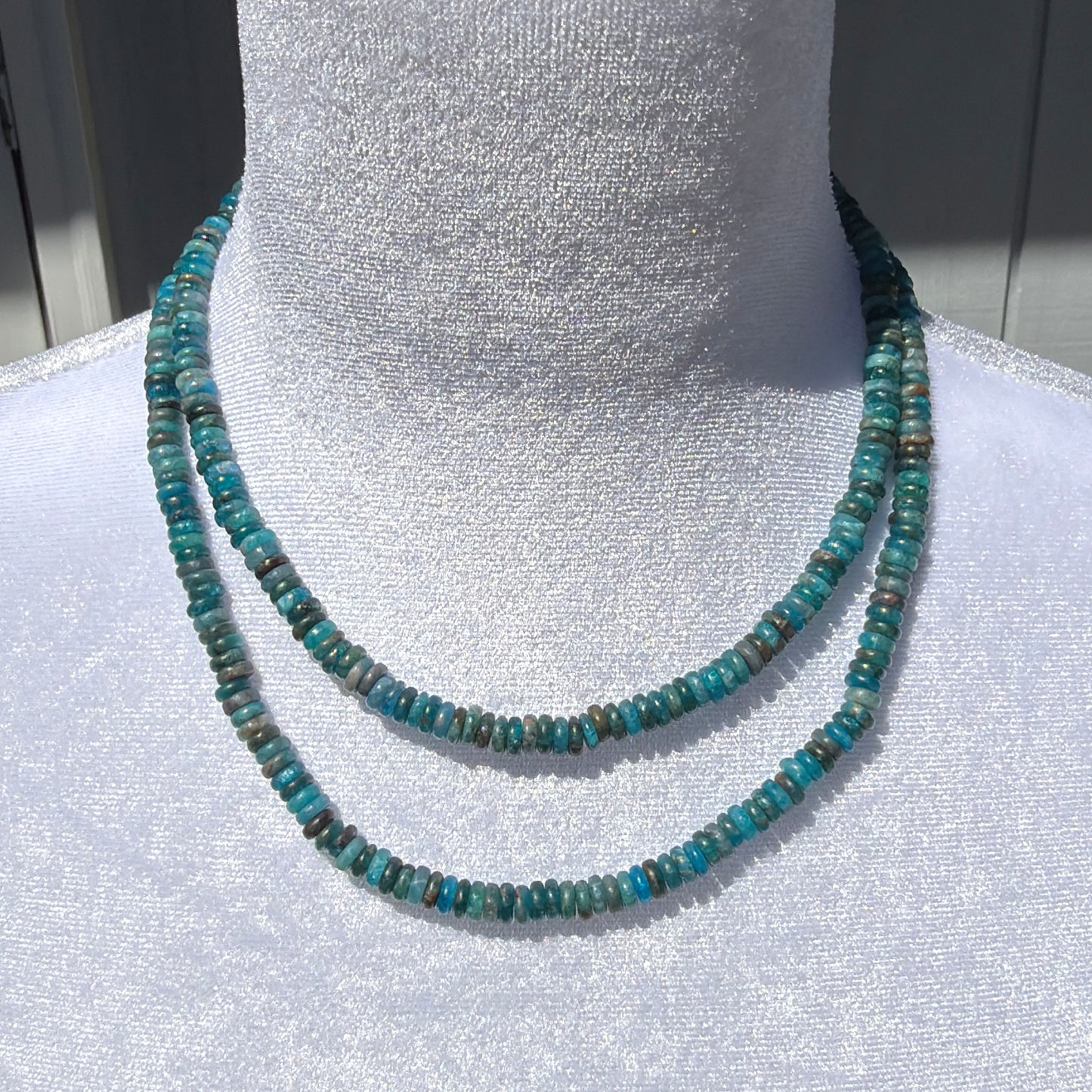 Blue Apatite Rondelle Necklaces in 16-inch and 18-inch Lengths Displayed on Mannequin