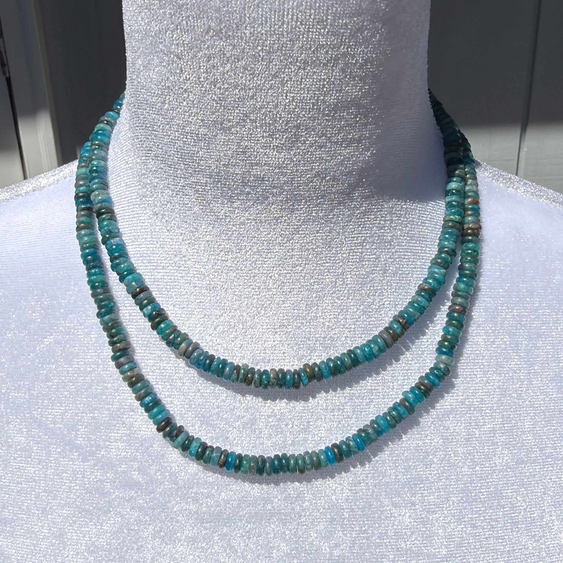 Blue Apatite Rondelle Necklaces in 16-inch and 18-inch Lengths Displayed on Mannequin