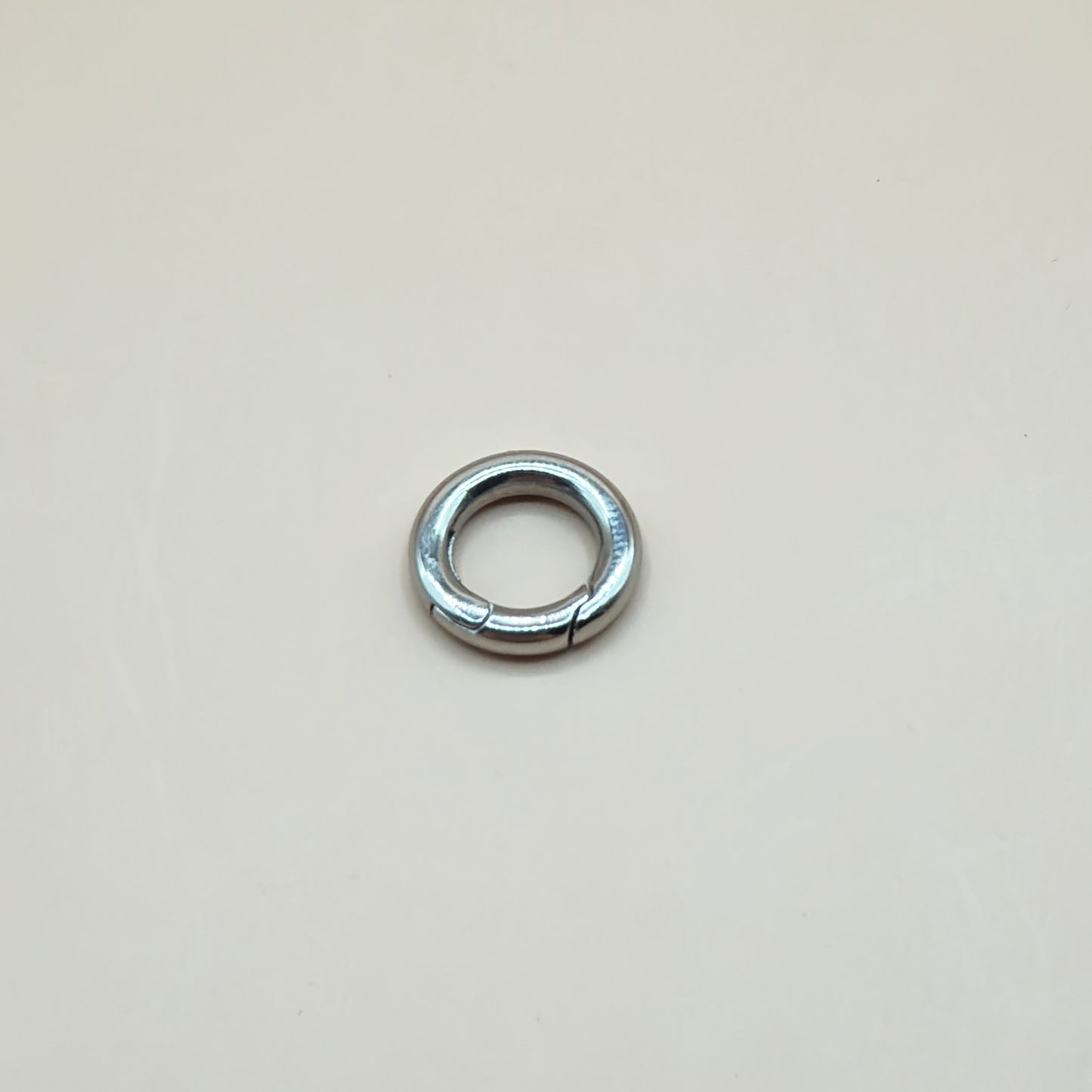 Stainless Steel round push clasp.
